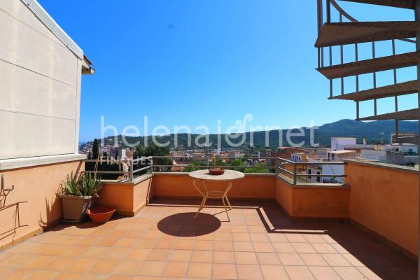 Casa adossada a Sant Feliu de Guíxols