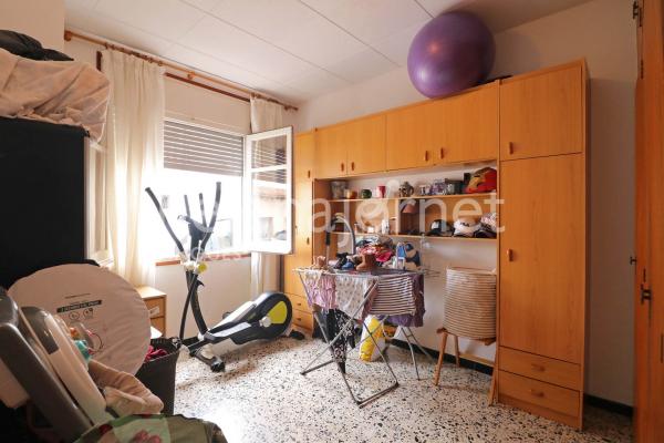 Casa adossada a Sant Feliu de Guíxols