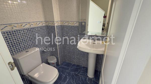 Casa adossada a Sant Feliu de Guíxols