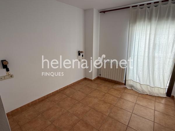 Casa adossada a Sant Feliu de Guíxols