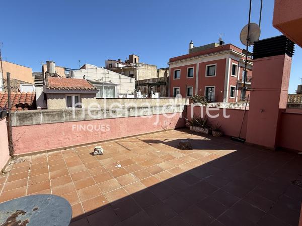 Casa adossada a Sant Feliu de Guíxols