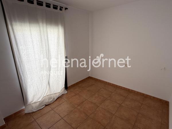 Casa adossada a Sant Feliu de Guíxols